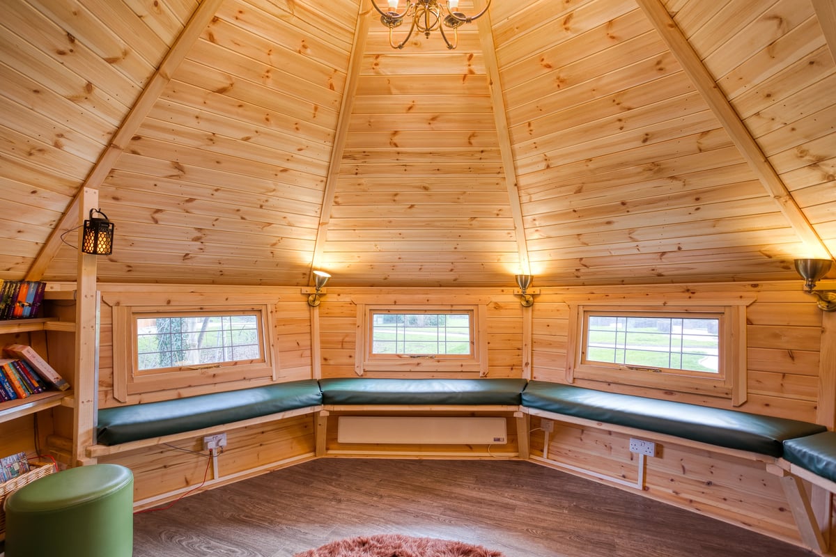 circular seating area in cosy school book nook