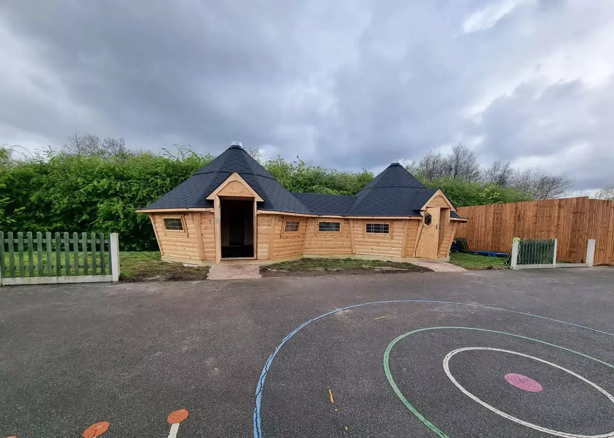 connected log cabins for outdoor learning 