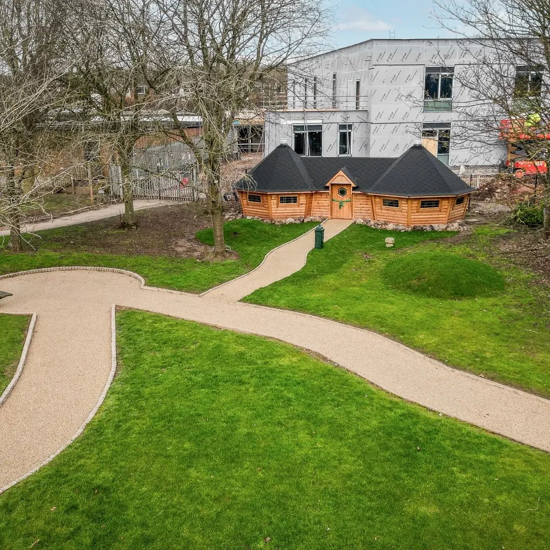 connected log cabins for sherbourne fields school in coventry 